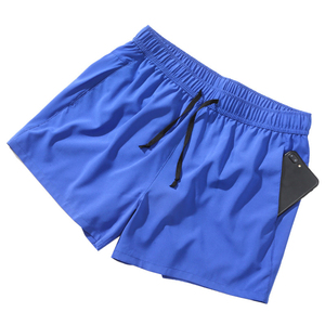 Short de bain pour homme bleu à séchage rapide, taille élastique, avec poches, en polyester tricoté, couleur unie, longueur mi-cuisse, cordon de serrage - Product Image 4