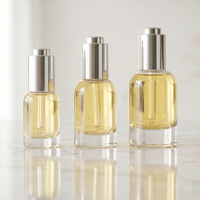 Ensemble d'emballages de luxe pour soins de la peau, flacon compte-gouttes en verre à bouton-poussoir 30ml 50ml, flacon de sérum à base lourde 30ml avec boîte en tube cartonné