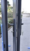 Porte d'entrée principale double vitrage style moderne RG80 en alliage d'aluminium, à ouverture latérale, isolation phonique et thermique, pour atelier et école