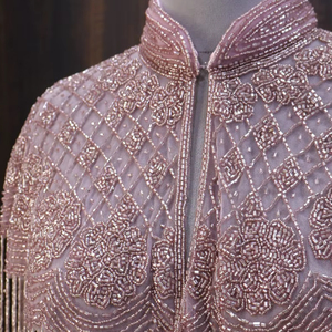 เสื้อปอนโชประดับลูกปัดทำมือคุณภาพพรีเมียม พร้อมพู่ห้อยมุก สำหรับงานเลี้ยงฉลองสมรส งานเลี้ยงบนเรือ หรืองานเลี้ยงอาหารค่ำชมพระอาทิตย์ตก มีจำหน่ายแล้ว - Product Image 1