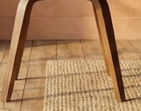 Chaise de réception vintage empilable en acier avec dossier croisé en X et coussin en rotin, idéale pour mariages et événements - Vente en gros