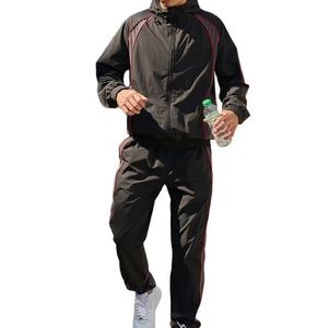 Survêtement en nylon léger personnalisé avec patchwork, veste zippée à bandes réfléchissantes, ensemble de jogging 2 pièces, coupe-vent, survêtement pour homme - Product Image 1