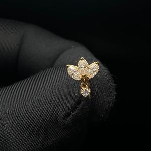 Boucles d'oreilles pendantes sophistiquées en or 10 carats avec diamant en forme de lotus et piercing incurvé 16G - Product Image 5