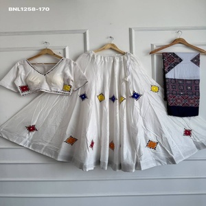 Fournisseur de la tenue complète (Lehenga évasé, Choli et Dupatta) en coton Khadi Ajrakh de haute qualité avec broderies de patchs et de miroirs, prêt-à-porter, de Surat - Product Image 1
