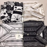 Expédition immédiate Bangladesh : Lot de chemises en polyester imprimées de style de marque Global Meow Fashion, stock disponible, livraison rapide pour l'été
