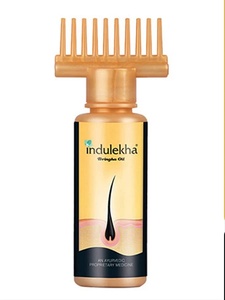 Huile capillaire ayurvédique Bringha 100ml – Formule 2-en-1 anti-chute et stimulante pour la croissance, à l'huile de coco, d'argan et de gingembre, pour usage domestique avec peigne - Product Image 1