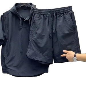 Camisetas y pantalones cortos de nailon para hombre, trajes holgados elásticos elegantes para exteriores, nuevas tendencias a juego, conjuntos de prendas de vestir exteriores lisas - Product Image 1