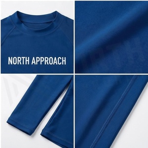 ชุดว่ายน้ำสีน้ำเงินสำหรับผู้หญิง North Approach พร้อมกระโปรงระบายและชุดเลกกิ้ง ผ้าถักยืดสีพื้น คอกลม แขนยาว - Product Image 4