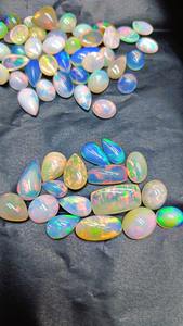 โอปอลเอธิโอเปียคุณภาพสูง AA แบบธรรมชาติ ทรงคาโบชอง เอเมอรัลด์คัท หลายสี 2-3 กะรัต ขนาดฟรีไซส์ พลอยหลวมสำหรับทำเครื่องประดับ - Product Image 4