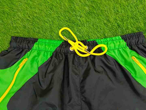 Shorts de sport pour homme à blocs de couleur, motif géométrique, séchage rapide, taille à cordon de serrage, longueur mi-cuisse, tissu polyester - Product Image 3