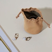Bolsa de joyería de cuero marrón claro de calidad Hogh, embalaje con cordón, bolsa de herramientas de cuero genuino, bolsa de viaje de embrague