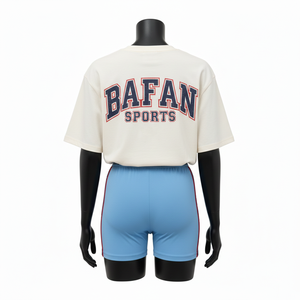 Ensemble t-shirt et short en coton stretch pour femme, avec empiècements rayés et logo imprimé par transfert thermique, 100 % coton. - Product Image 2