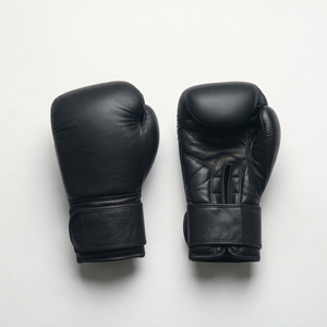 Gants de boxe professionnels en cuir véritable noir 12 oz avec fermeture auto-agrippante pour entraînement et sparring, personnalisables avec logo OEM YM-BG-57 - Product Image 1