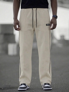Nouveau pantalon de survêtement décontracté pour homme, beige, taille élastique, bande latérale, 100 % coton, respirant, tricoté, léger, moderne, pour l'automne - Product Image 2