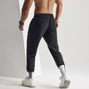 Pantalon de survêtement noir pour homme, taille élastique avec cordon de serrage, séchage rapide, léger, décontracté, avec poches latérales, pour l'été - Product Image 2
