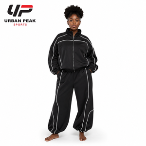 Conjunto Deportivo Versátil para Mujer, Talla Grande, con Parte Superior Espaciosa, Pantalones Coordinados y Diseño Cómodo para Ropa Casual - Product Image 1