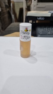 APIEU HONEY&MILK <b>LIp</b> OIL 5g exp date 2028.03.16 - Product Image 1