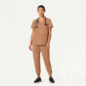 Conjunto de Uniformes Médicos Unisex de Algodón y Poliéster, Color Beige, Cuello en V, Manga Corta, con Lazo para Estetoscopio y Bolsillo para Detección de Agujas - Product Image 1