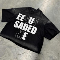 T-shirt noir oversize pour homme, effet délavé, manches courtes, col rond, style streetwear, en jersey de coton, imprimé « Jésus m'a sauvé » avec lettrage frontal