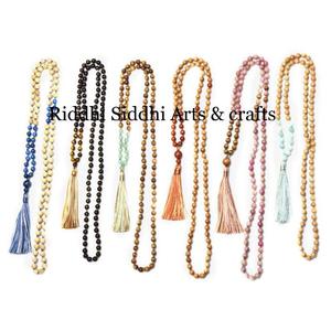 Venta al por Mayor de Cuentas de Piedras Preciosas Unisex con Borla para el Año Nuevo - Product Image 1