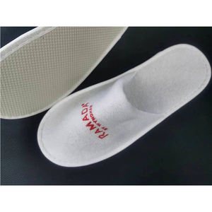 Pantuflas Desechables Blancas de Tela No Tejida para Hotel, con Asa de Plástico y Cerdas de Silicona, Ligeras, para Habitaciones de Huéspedes - Product Image 1