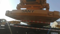 Grúa sobre Camión SANY 90T Económica, Modelo 2020, Usada de Alta Calidad, Caja de Cambios Esencial en Buen Estado, Uso en Construcción, Enfoque en el Núcleo Central