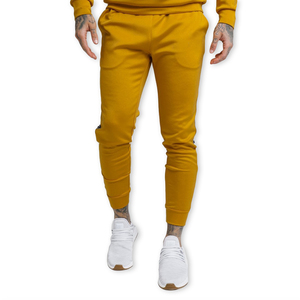 Pantalon de survêtement jaune moutarde pour homme, taille élastique, décontracté, avec poches latérales, en coton tricoté respirant, idéal pour l'automne - Product Image 1