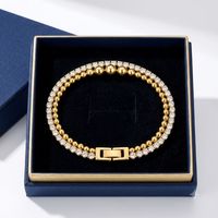 Bracelet double couche en acier inoxydable plaqué or 18 carats avec chaîne tennis en zircon cubique pour femme