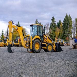 Chargeuse-pelleteuse CAT d'occasion en bon état, 4x4, avec chargeur frontal et pelle arrière, pour travaux d'ingénierie et de construction - Product Image 1