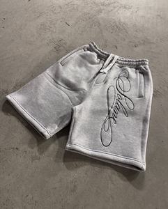 Shorts en coton streetwear pour homme, gris chiné, avec logo brodé en écriture gothique, style décontracté - Product Image 3