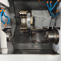 Centre d'usinage 5 axes Tsugami M06SJ-II haute précision, automatique, comme neuf, pour petites pièces filetées de précision