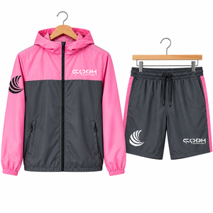 Ensemble de survêtement coupe-vent unisexe léger rose et gris avec blocs de couleur, capuche zippée, design sportif, en polyester respirant - Product Image 1