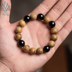 กำไลไม้กฤษณาทำมือขายส่ง รุ่น AL-SB-0010-12 ประดับด้วยลูกปัดปะการังฟอสซิล 5 เม็ด และลูกปัดไม้กฤษณาธรรมชาติ 12 เม็ด ของขวัญสุดพิเศษ - Product Image 2