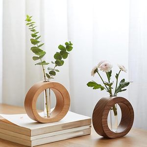 Moderno Florero Redondo de Vidrio y Madera Natural con Diámetro de 4"-6" Decorativo para Decoración del Hogar y Bodas - Product Image 1