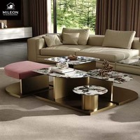 Un fabricant chinois a conçu une nouvelle table basse moderne de luxe sur mesure avec un plateau en marbre et un cadre en métal pour le salon