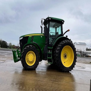 Tracteur à roues John Deere 7230R 75HP 4WD avec système de pompage de moteur avancé, conçu pour les opérations agricoles modernes à grande échelle. - Product Image 1