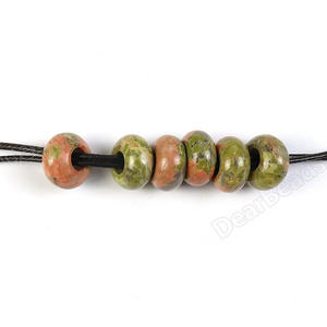 Vente en gros de pierres précieuses AAMNA GEMS, diopside naturel blanc et noir, coupe ovale, pierre de paume, perles à grand trou pour la fabrication de bijoux - Product Image 1