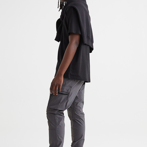 Pantalon de jogging athlétique pour homme, idéal pour la gym et la course, 100 % coton, séchage rapide, avec cordon de serrage, taille élastique et poches latérales - Product Image 1