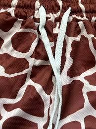 all-over giraffe <b>animal</b> print, they utilize a high-breathability mesh construction that is synonymous with vintage-inspired bask - Product Image 2