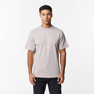 Camiseta de algodón de alta calidad para hombre, estilo urbano, oversize, con hombros caídos, personalizable con logo impreso, de tela gruesa, color blanco. - Product Image 1
