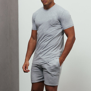 Shorts de sport pour hommes, vente en gros, entraînement actif, course à pied, séchage rapide, respirant, Oxford, 5 pouces, taille élastique, coupe asymétrique, couleur unie - Product Image 1