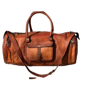 กระเป๋าดัฟเฟิลหนังแท้สำหรับผู้ชายและผู้หญิงกระเป๋าสะพายไหล่สำหรับเล่นยิมกีฬาวีคเอนเดอร์ดีไซน์ใหม่ - Product Image 1