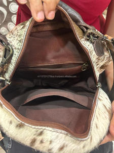 Sac de cantine en cuir repoussé à la main sac à main rond repoussé pour femmes sac à bandoulière en cuir de fourrure imprimé de fleurs - Product Image 6