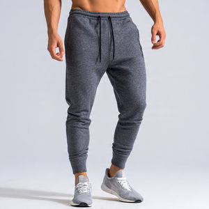 Pantalon de jogging pour homme à taille haute avec cordon de serrage, en polyester/coton respirant et écologique, idéal pour la gym, le fitness, l'entraînement et les loisirs - Product Image 1