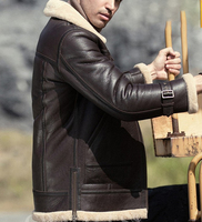Manteau long décontracté pour homme en cuir texturé marron avec garniture en peau de mouton crème contrastante et fermeture éclair intégrale, vente en gros, direct usine