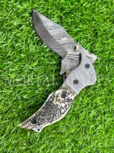 Venta al por mayor al aire libre hecho a mano de acero de Damasco cuchillo plegable cuchillo grabado mango de hueso de camello mejores cuchillos plegables - Product Image 3