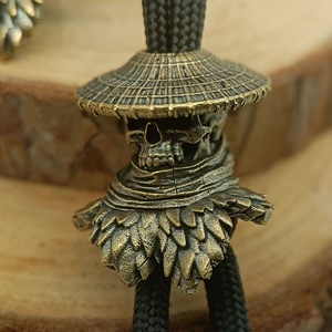 Charme de crâne en laiton artistique Gear Skeleton Cutter Charm pour équipement tactique Accessoire de bricolage <span class=keywords><strong>personnalisable</strong></span> pour les amateurs de plein air - Product Image 5