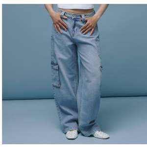 กางเกงยีนส์คาร์โก้ขาบานทรงหลวมเอวสูงคุณภาพสูงสำหรับผู้หญิง ล้างสีอ่อน สไตล์สตรีทแฟชั่น ขายส่ง - Product Image 6