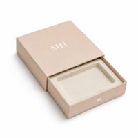 Boîte cadeau personnalisée écologique réutilisable beige avec insert floqué et logo MH pour bijoux, cosmétiques et parfums
