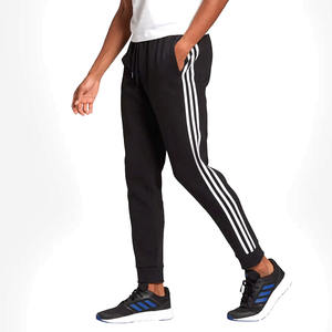 Pantalon de survêtement athlétique slim fit pour homme avec logo personnalisé, côtés rayés, en molleton de polyester et coton, pour la course et l'entraînement, vente en gros - Product Image 2